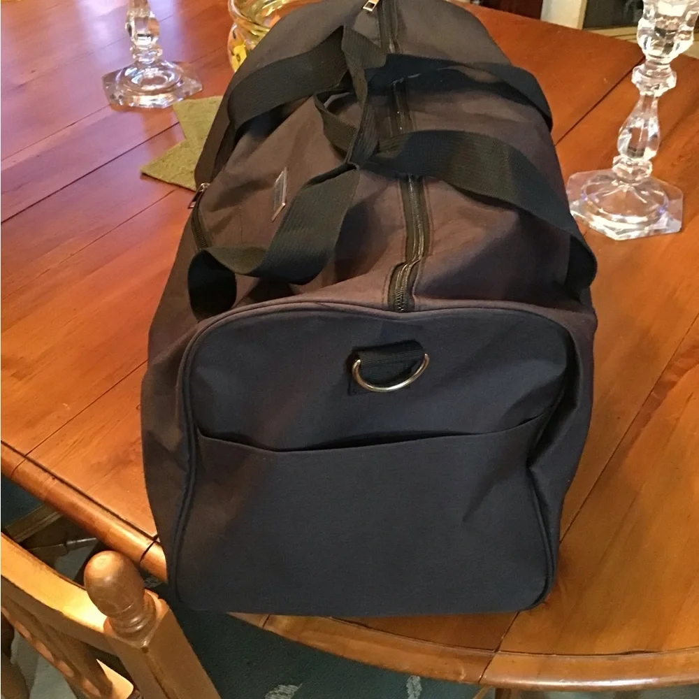 NWOT Prestige Travel Duffle Bag in Black.